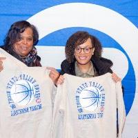 Girl and mom smile with sweatshirts